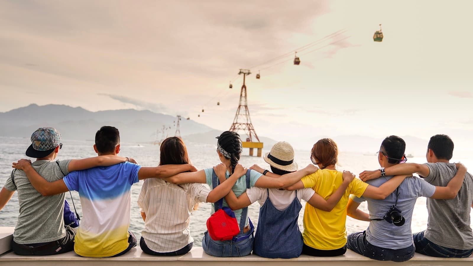 Friends laughing together outdoors — community member life