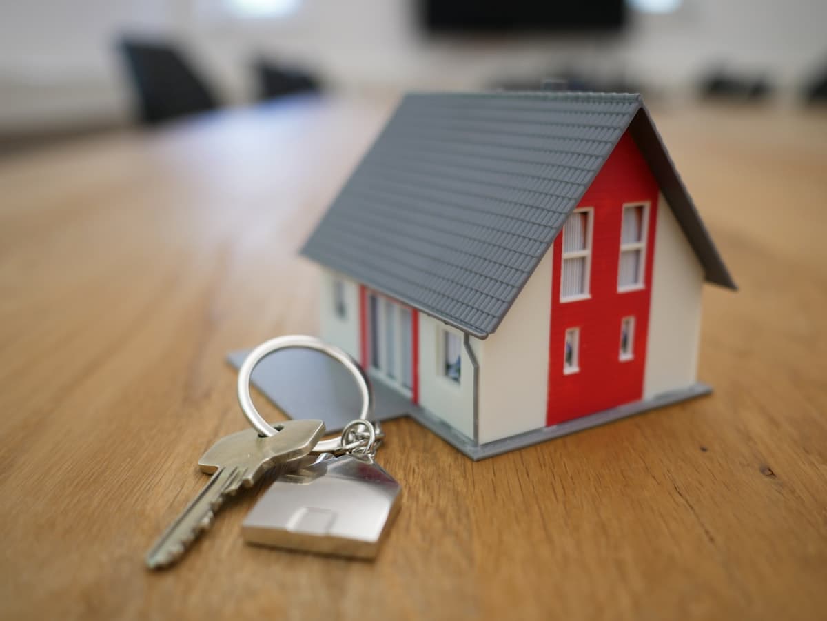 Residential property keys and paperwork for HOA dues