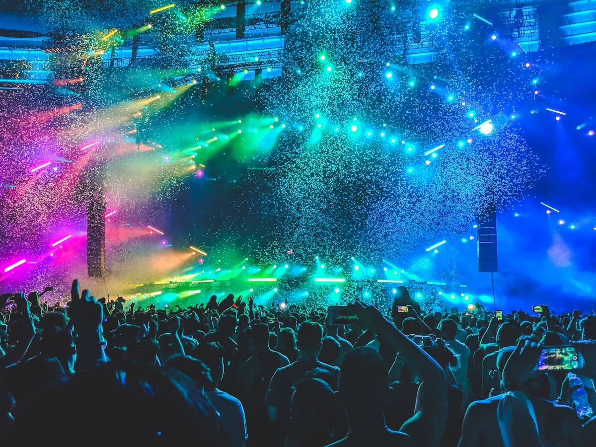 Packed venue with lights during a live event